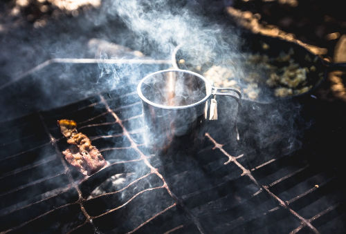 chef using Open Fire Kitchen technique in Cabo San Lucas